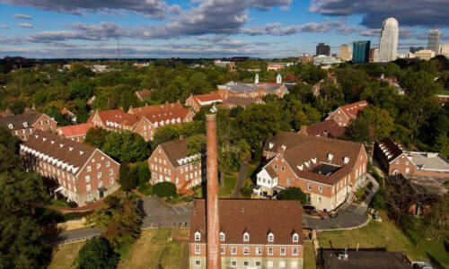 Aerial view of 十大买球平台 College campus with Winston 十大买球平台 in the background